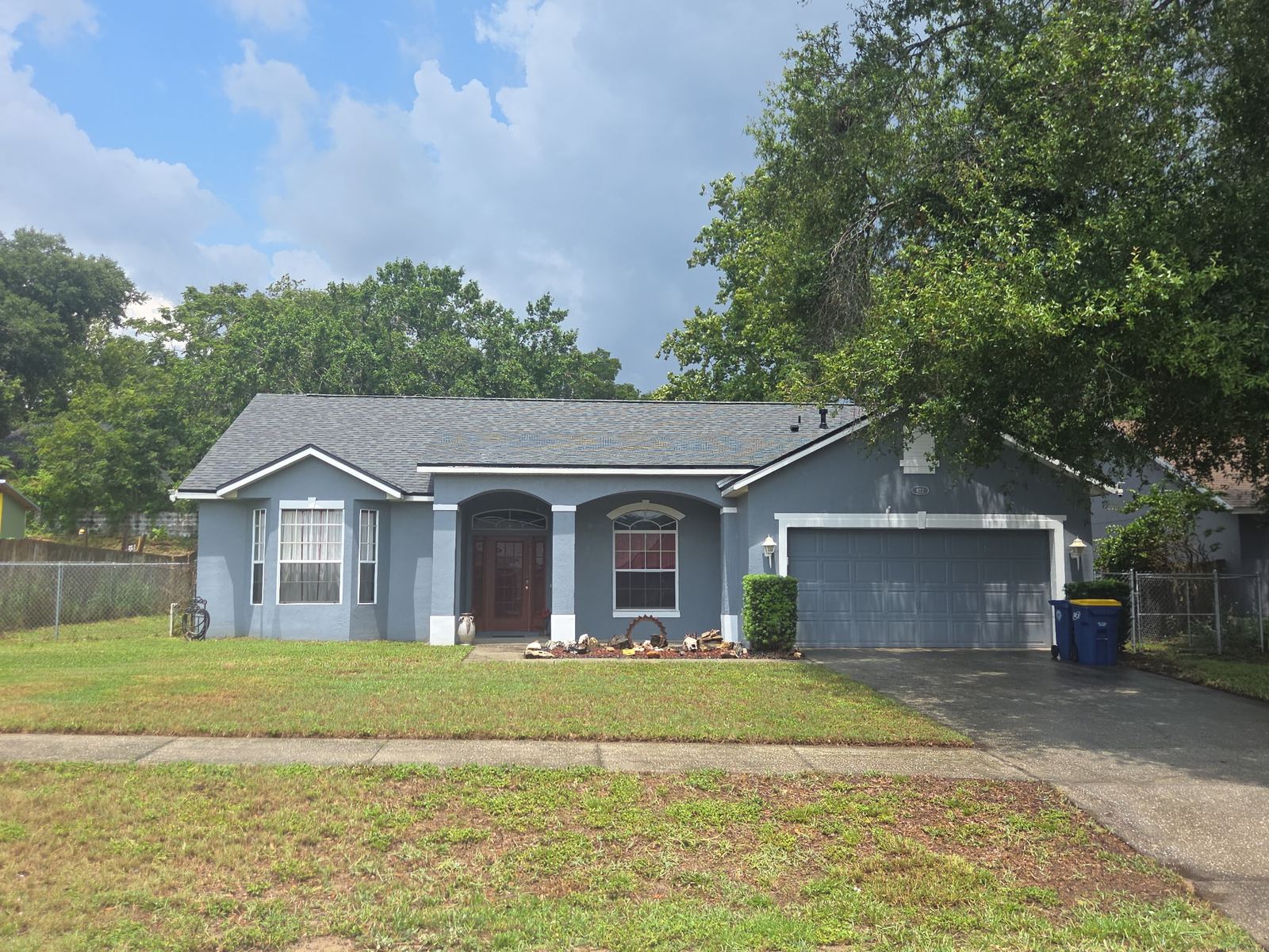 Trimmed lawn and tidy landscaping at a residential property